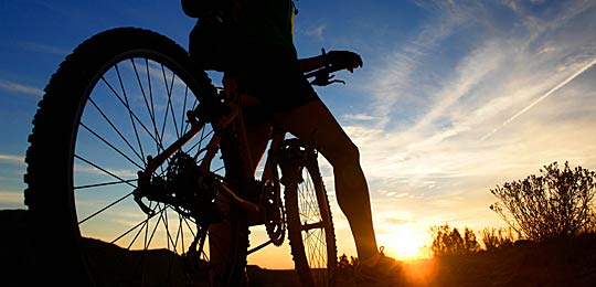 cyclist at sunrise